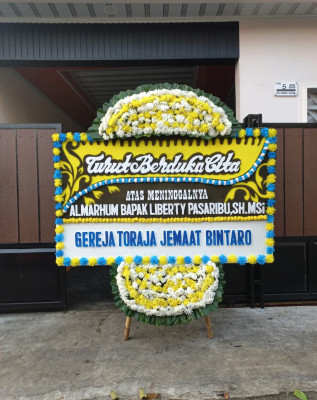 Papan Bunga Duka di Pamoyanan